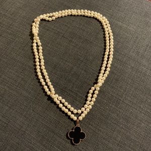 Faux Pearl necklace with clover leaf charm